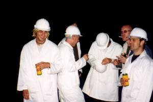Men in white with beer